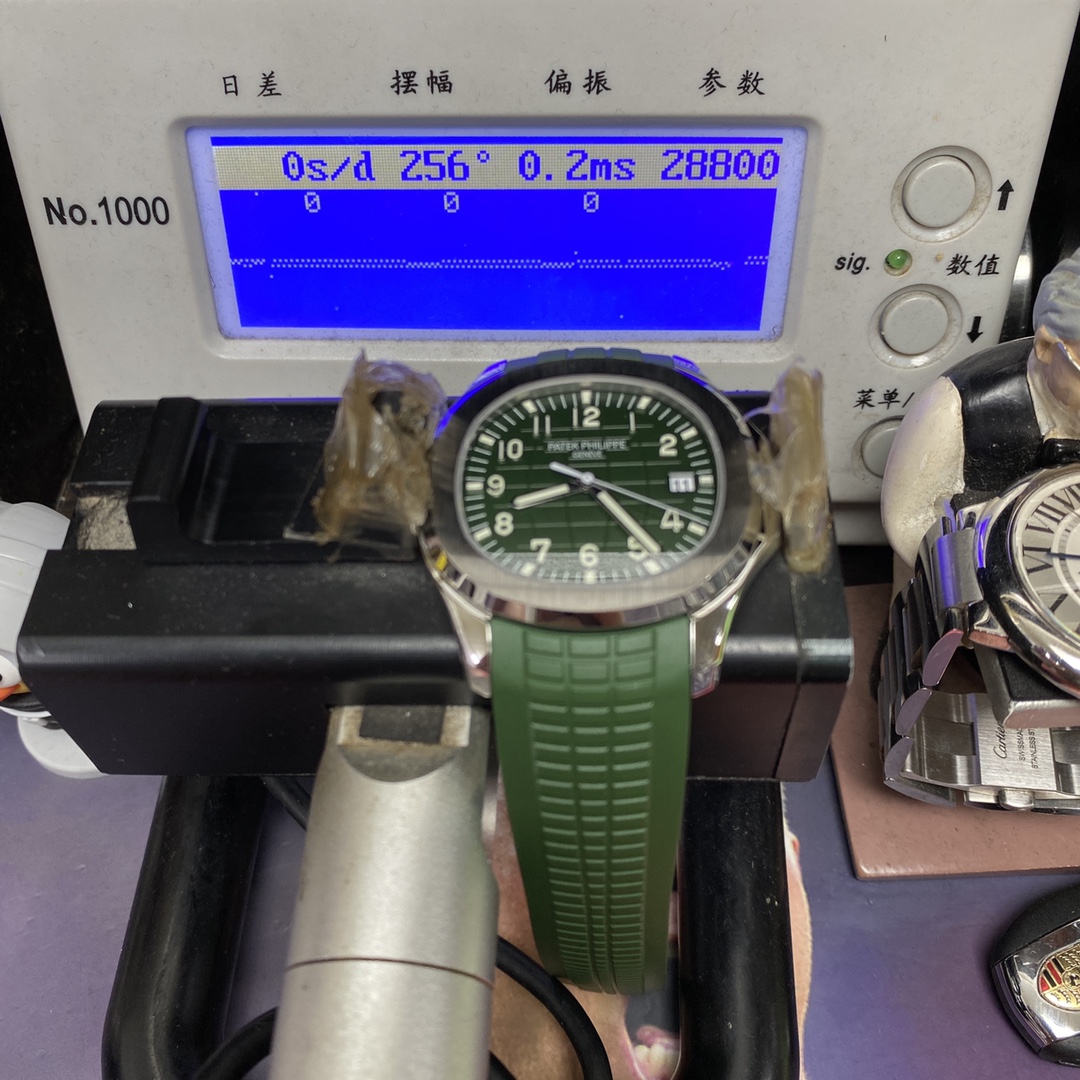 Patek Philippe Aquanaut Series 5168G-010, Green Dial Green Rubber Strap, 42.2mm Size.
