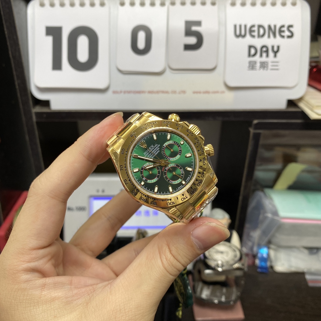 Rolex Cosmograph Daytona series m116508-0013, gold case green dial, 40mm size.