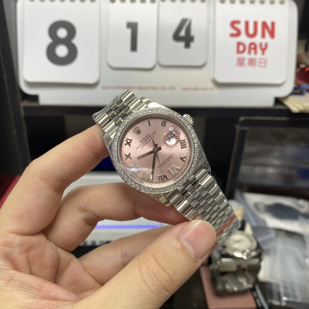 Rolex Datejust Series m126234-0031, Pink Dial Roman Numeral Markers Diamond Bezel, 36mm Size.