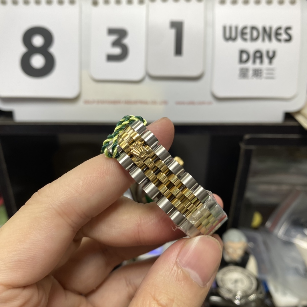 Rolex Datejust Series 178343-63163, Two-Tone Gold Case Silver Dial with Diamond Hour Markers Round Arched Bezel Set with Diamonds, 31mm Size, Five-Link Steel Bracelet.