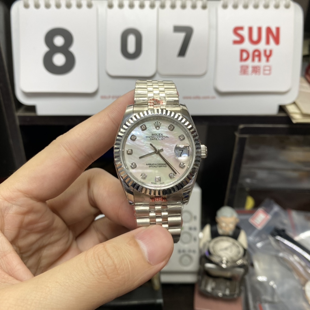 Rolex Datejust Series m126234-0019, White Mother-of-Pearl Dial with Diamond Hour Markers, 36mm size, Jubilee stainless steel bracelet.
