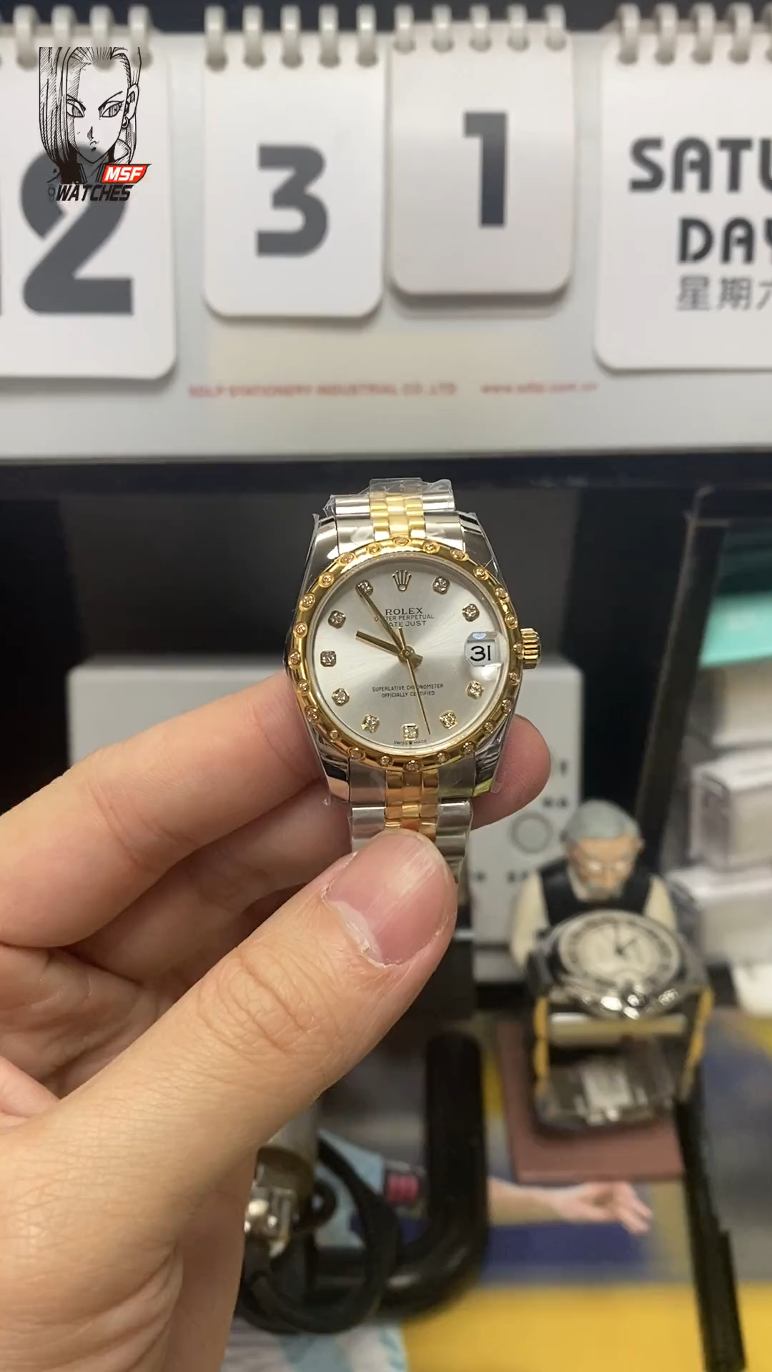 Rolex Datejust Series 178343-63163, Two-Tone Gold Case Silver Dial with Diamond Hour Markers Round Arched Bezel Set with Diamonds, 31mm Size, Five-Link Steel Bracelet.