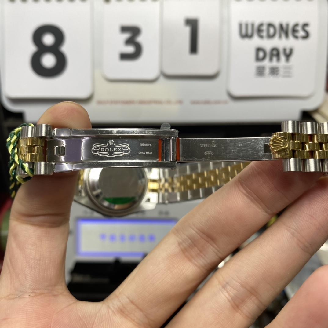 Rolex Datejust Series 178343-63163, Two-Tone Gold Case Silver Dial with Diamond Hour Markers Round Arched Bezel Set with Diamonds, 31mm Size, Five-Link Steel Bracelet.