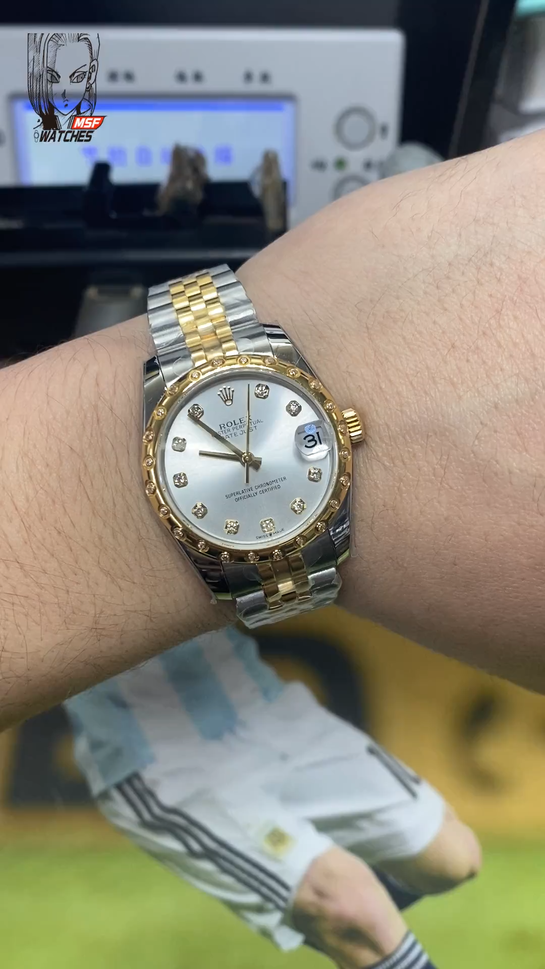 Rolex Datejust Series 178343-63163, Two-Tone Gold Case Silver Dial with Diamond Hour Markers Round Arched Bezel Set with Diamonds, 31mm Size, Five-Link Steel Bracelet.