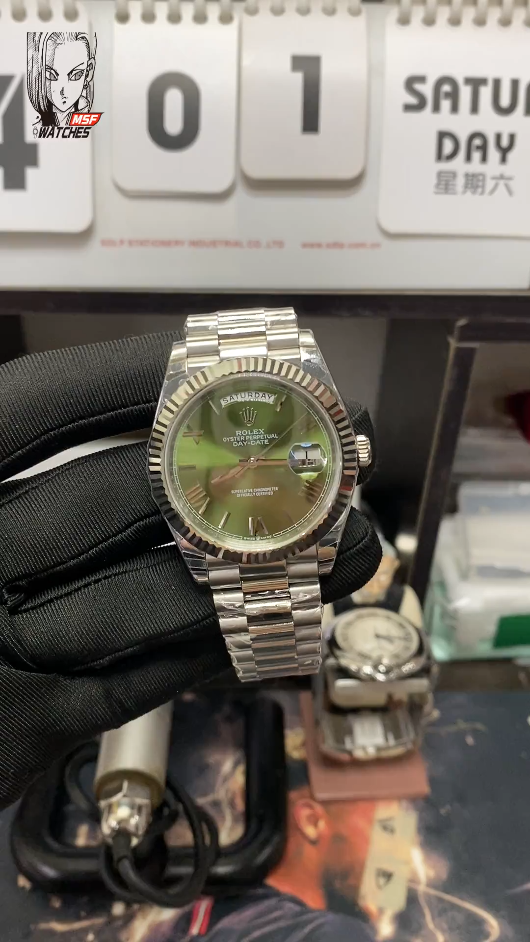 Rolex Day-Date series m228239-0033, Silver Case Olive Green Dial with Roman Numeral Markers, Instantaneous Day and Date Functions, 40mm Size.